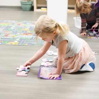Girl Making Puzzle